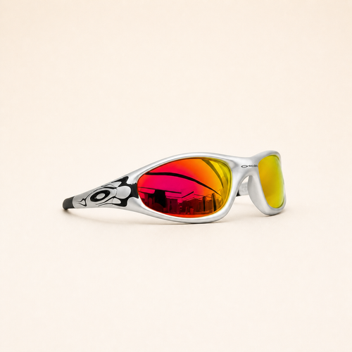 Oakley Minute sunglasses in silver with black flame graphics and red-orange mirrored lenses, three-quarter view.